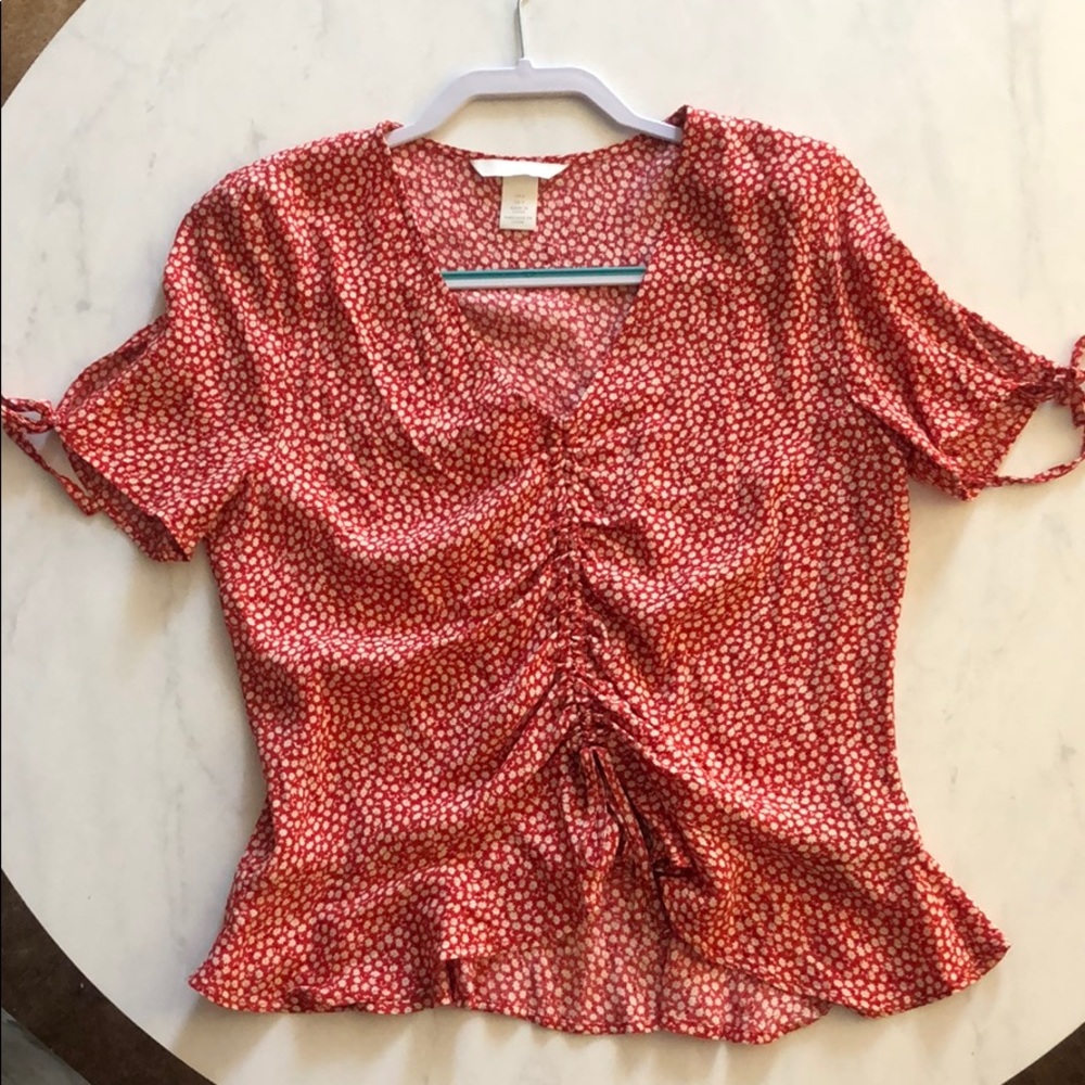 Red floral print with ruche gathering center
